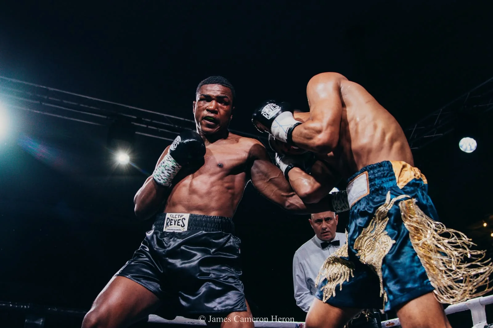 Two boxers exchange punches during a past Warrior Ascent fight night.